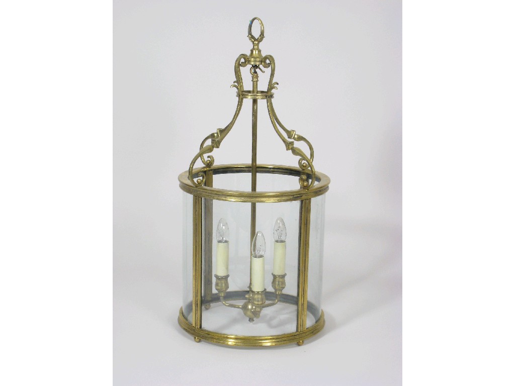 Appraisal: A large brass framed circular Hall Lantern with four glazed