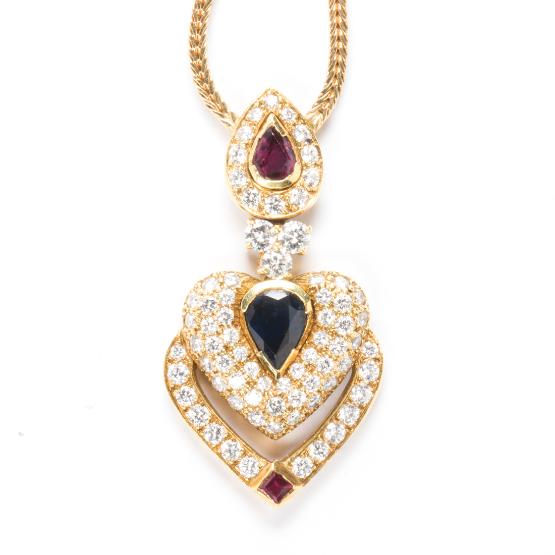 Appraisal: A GEMSTONE AND EIGHTEEN KARAT GOLD PENDANT NECKLACE A gemstone