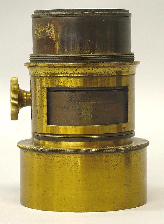 Appraisal: F J Cox brass bound lens with rack pinion focusing