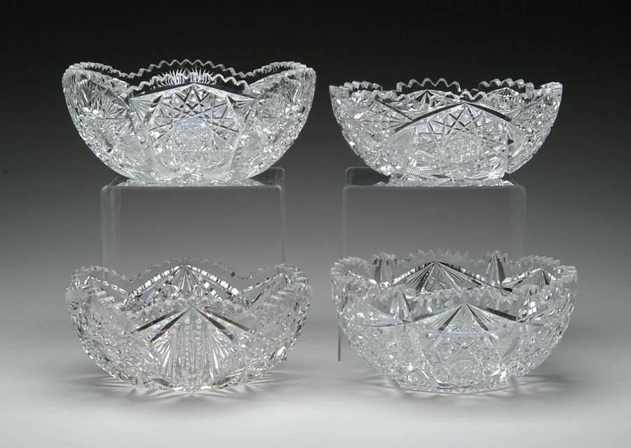 Appraisal: FOUR CUT GLASS BOWLS Cut in hobstar and fan pattern