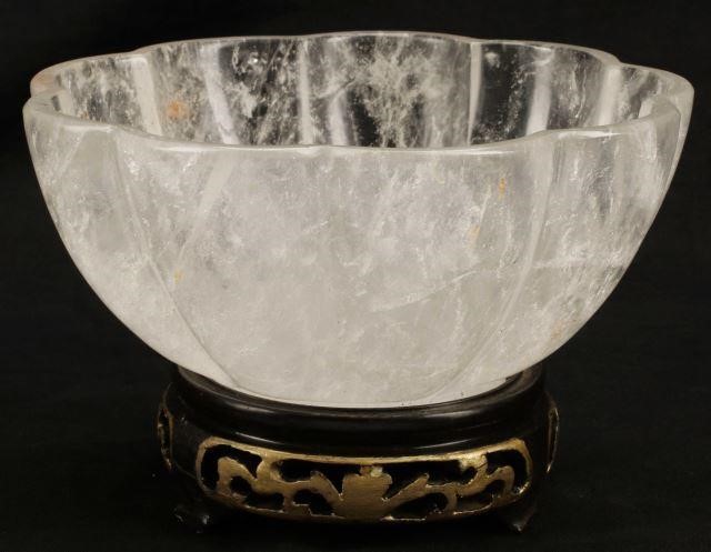 Appraisal: Rock crystal lobed bowl on wood base intact with natural