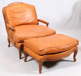 Appraisal: SAM MOORE FURNITURE LEATHER CHAIR AND OTTOMAN SAM MOORE FURNITURE