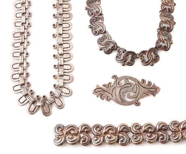 Appraisal: A collection of Mexican silver jewelry featuring three necklaces one