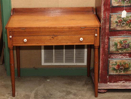 Appraisal: LIFT LID DESK Walnut with a gallery lift lid and