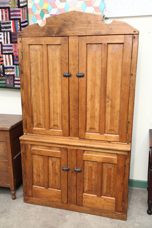 Appraisal: STEPBACK CUPBOARD Pine with a shaped crest two paneled doors