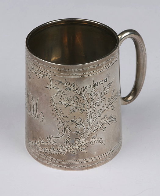 Appraisal: A SILVER CHRISTENING MUG of tapering form with engraved fern