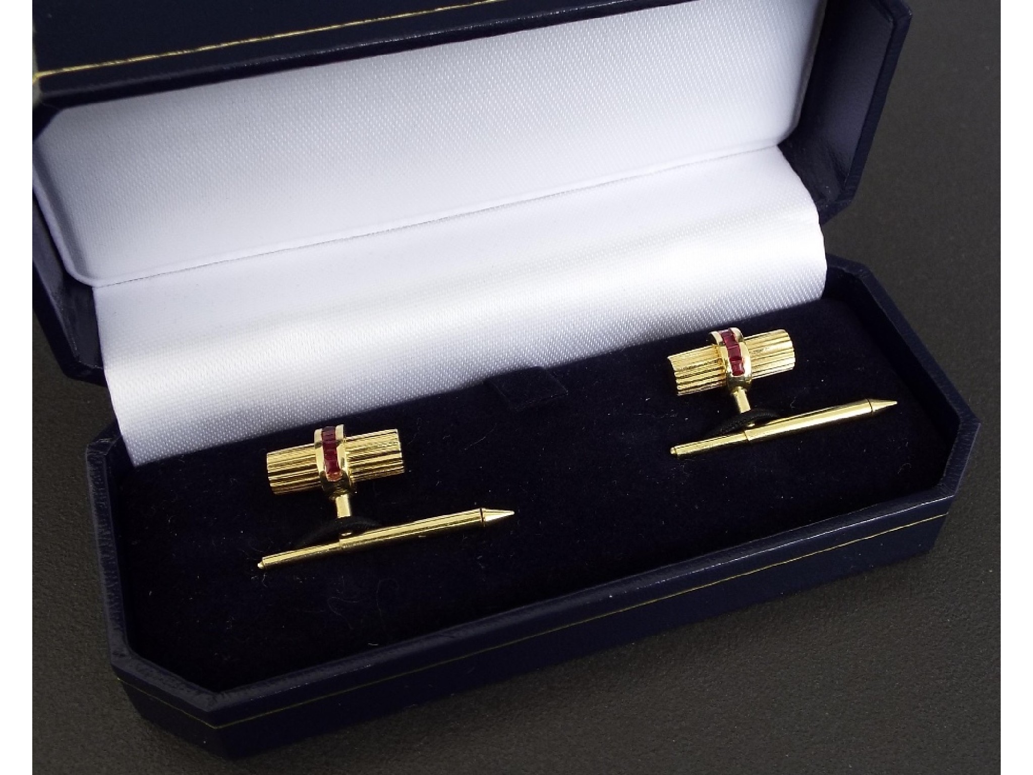 Appraisal: Pair of ct yellow gold and ruby set gentleman's cufflinks