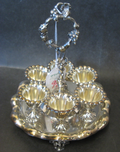 Appraisal: AMERICAN SILVER PLATED EGG CUP CASTER SET c having six