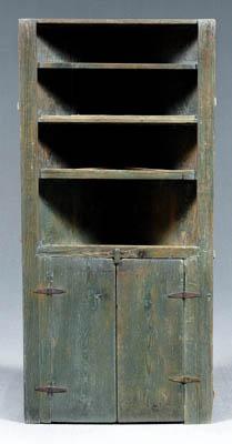 Appraisal: North Carolina corner cupboard one case construction with yellow pine