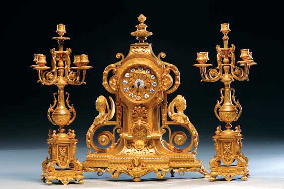 Appraisal: ANTIQUE FRENCH ORMOLU GARNITURE SET Antique French three-piece ormolu garniture