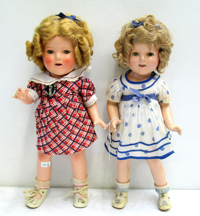 Appraisal: TWO SHIRLEY TEMPLE DOLLS composition shoulder head dolls with blond