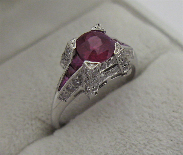 Appraisal: RUBY DIAMOND AND KARAT WHITE GOLD RING set with a