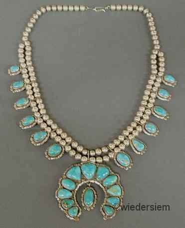 Appraisal: Silver and turquoise Squash Blossom'' necklace the claw clasp marked