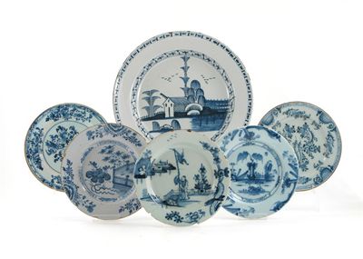 Appraisal: Fourteen Delftware blue and white plates variously painted with Oriental