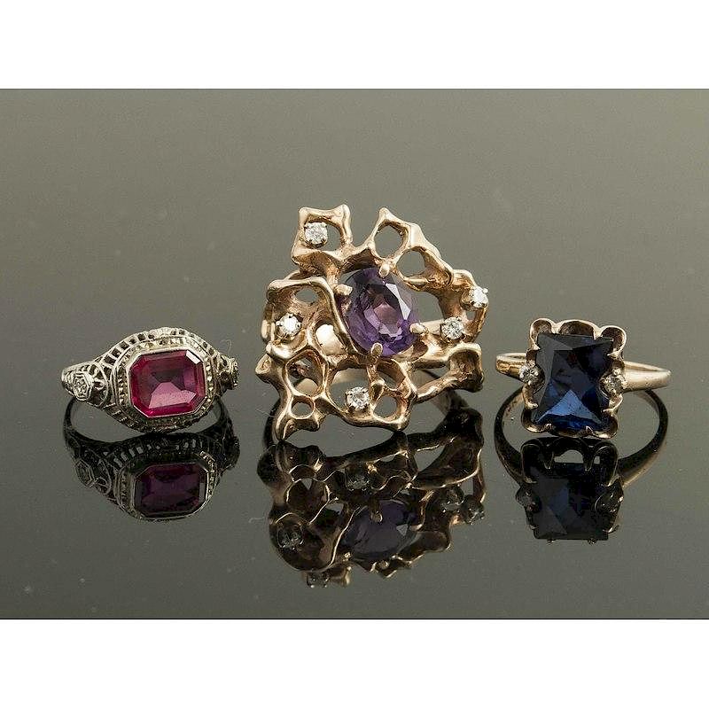 Appraisal: Three Gemstone Rings Lot of three rings comprising a synthetic