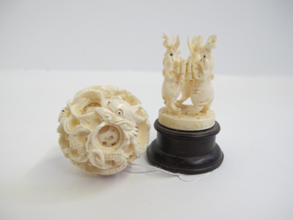 Appraisal: An ivory puzzle ball on stand