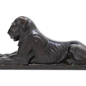 Appraisal: A Continental Bronze Figure of a Recumbent Lion Circa Length