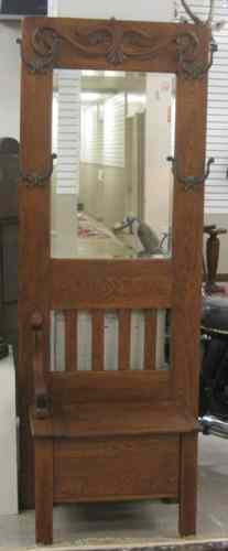 Appraisal: AN OAK BENCH-BASE HALLSTAND American c having a rectangular mirror