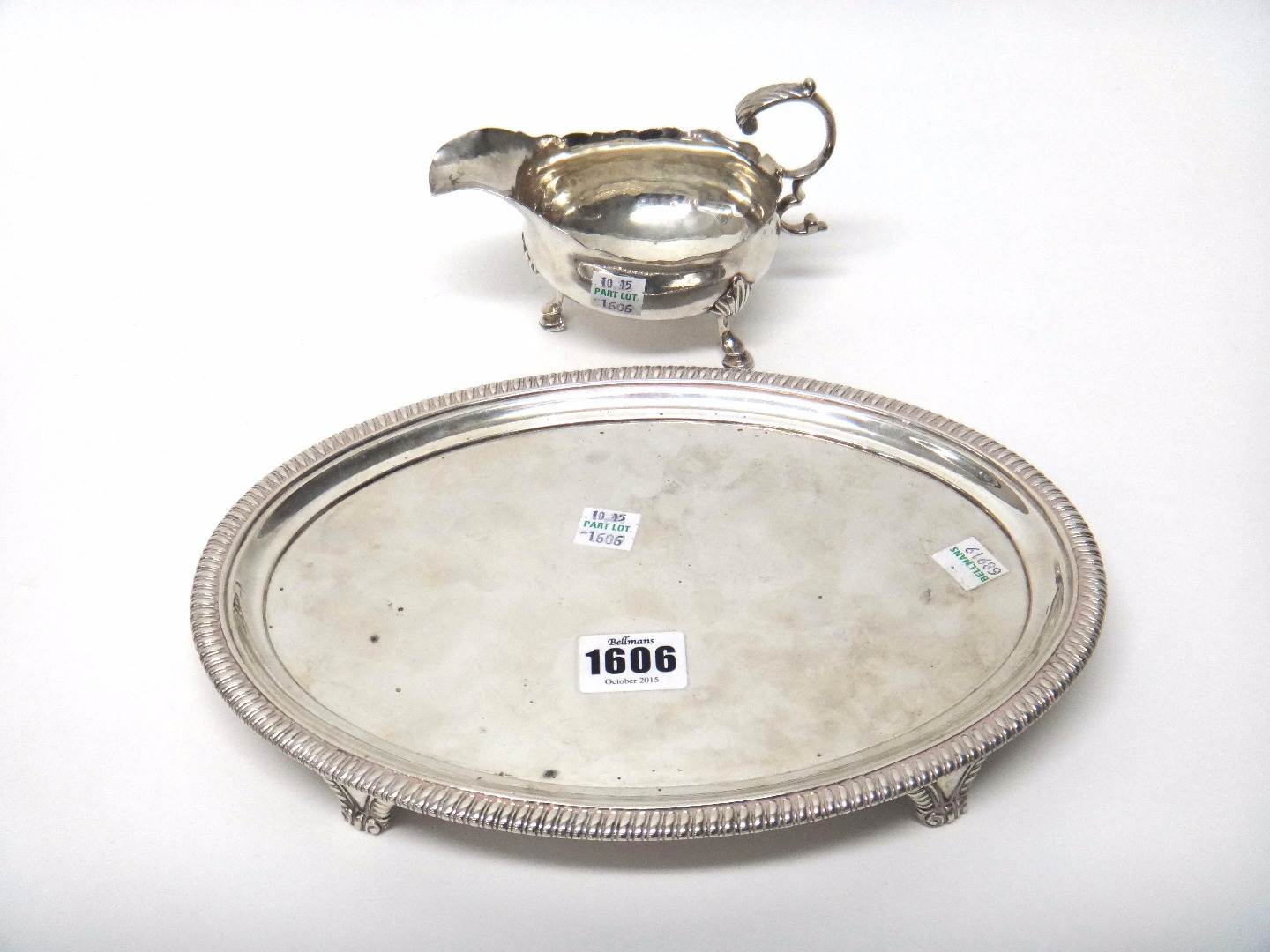 Appraisal: A George III silver oval salver decorated with a gadrooned