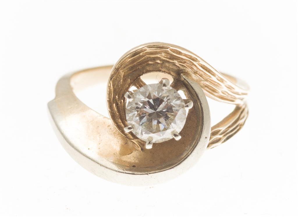 Appraisal: A modernist single stone diamond ring claw set with a