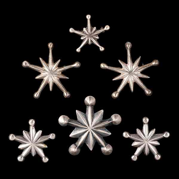 Appraisal: Navajo Tufa-Cast Star Burst Pins Collected by Virginia Doneghy -