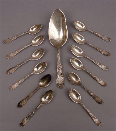 Appraisal: TWELVE TIFFANY CO MONOGRAMMED SILVER TEASPOONS AND AN ICE CREAM