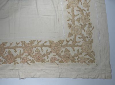 Appraisal: A Glasgow School embroidered linen tablecloth rectangular with a border