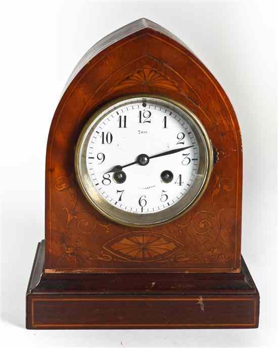 Appraisal: A Victorian Ebonized Wood Mantel Clock having an arched crest