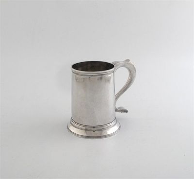 Appraisal: A George III provincial pint mug with moulded bands spread