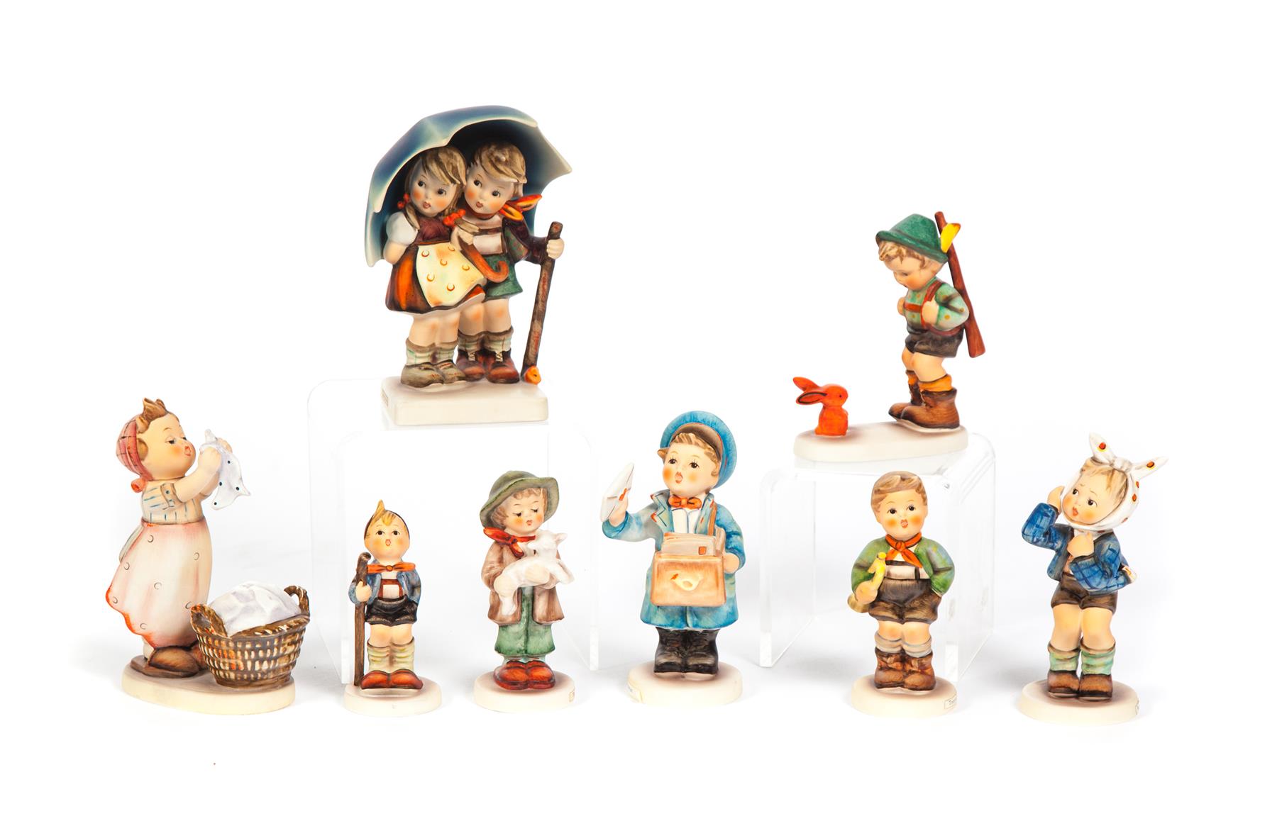 Appraisal: EIGHT HUMMEL FIGURINES Germany nd half- th century Wash day