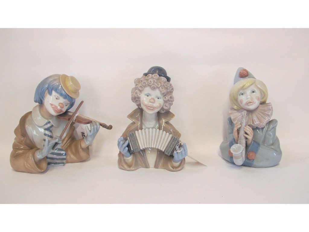 Appraisal: Three Lladro clown figures 'The Blues' 'Fine Melody' and 'Sad