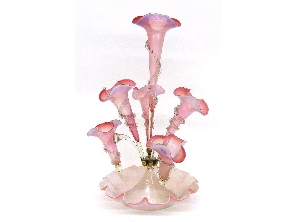 Appraisal: Victorian pink vaseline glass epergne with a central specimen tapering