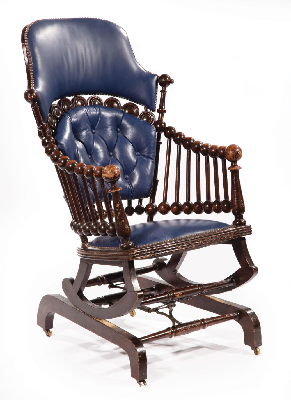 Appraisal: George Hunzinger Walnut Lollipop Rocking Armchair c with bleu marine