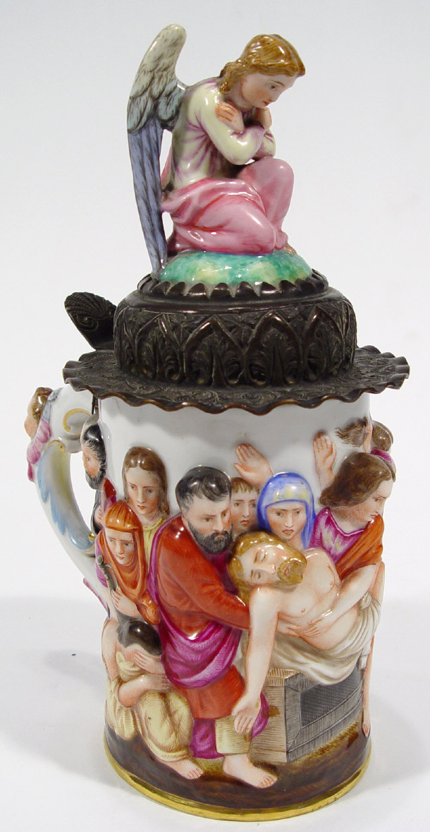 Appraisal: Naples porcelain tankard with embossed metal mount and angel knop