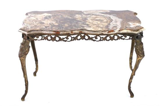 Appraisal: ROCOCO STYLE MARBLE-TOP GILT METAL SERPENTINE LOW TABLE late th