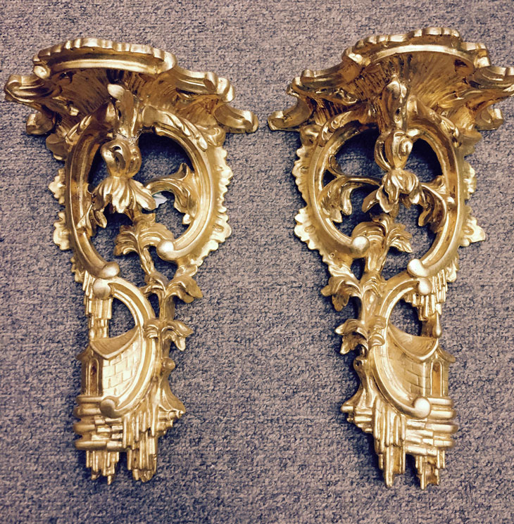 Appraisal: a Pair of gilt wall sconces Undernumber