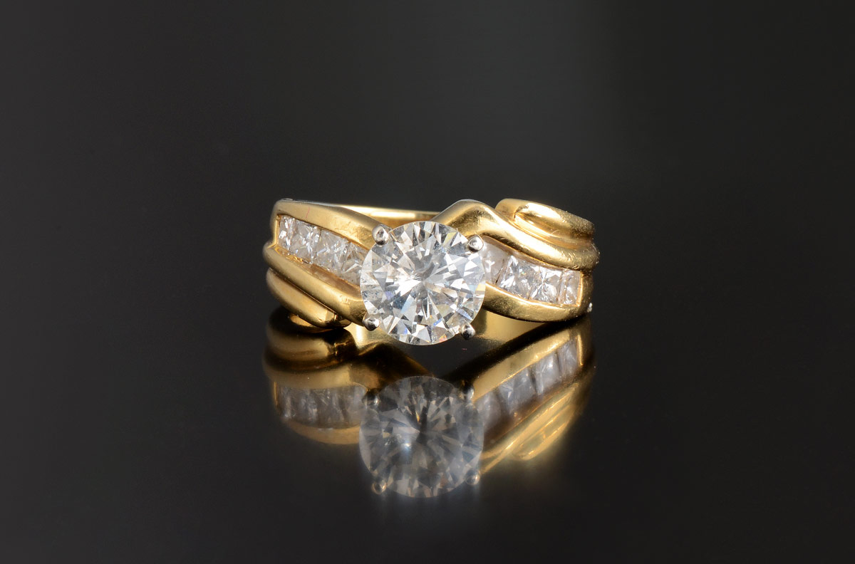 Appraisal: K CT CENTER DIAMOND RING K yellow gold ring contains