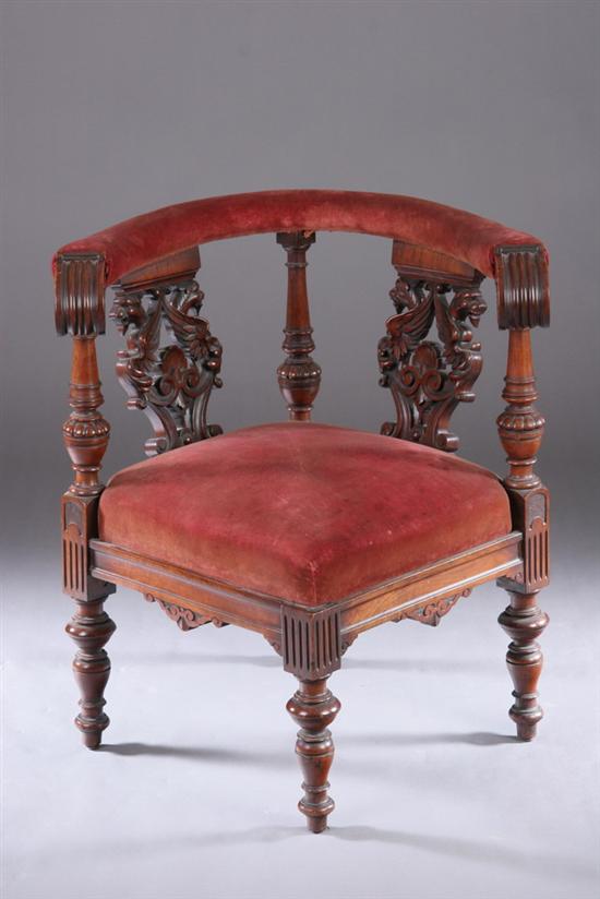 Appraisal: RENAISSANCE REVIVAL CARVED MAHOGANY CORNER CHAIR th century Curving padded