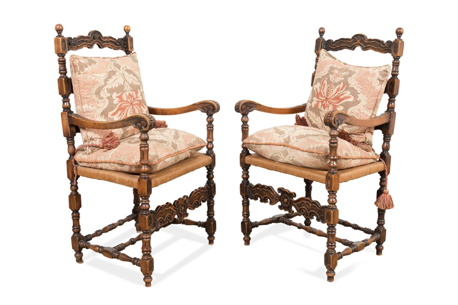 Appraisal: PAIR PROVINCIAL LADDERBACK ARMCHAIRS W CUSHIONS French Provincial style carved