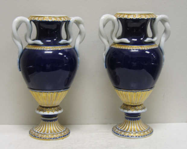 Appraisal: PAIR OF MEISSEN PORCELAIN URNS Each Empire style of footed