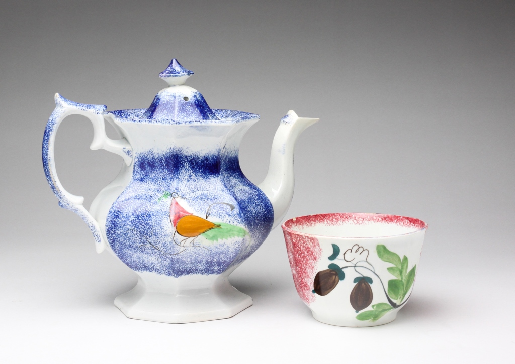 Appraisal: Second quarter th century Paneled blue teapot with peafowl Repaired