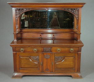 Appraisal: An Art Nouveau carved walnut mirror back sideboard circa the