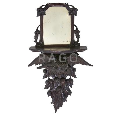 Appraisal: CARVED WOOD MIRRORED WALL SHELF Eagle form th c x