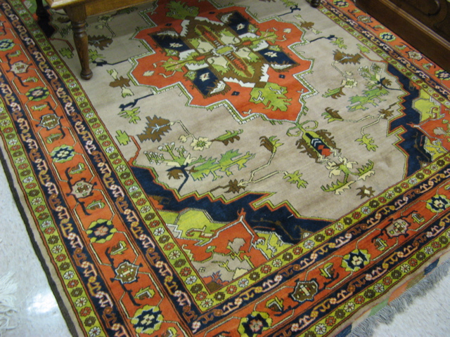 Appraisal: HAND KNOTTED AFGHANI TRIBAL CARPET central geometric medallion and stylized