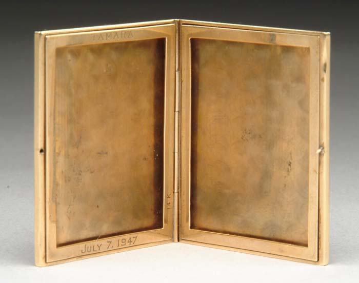 Appraisal: KT GOLD MINIATURE FOLDING PICTURE FRAME The piece with fine