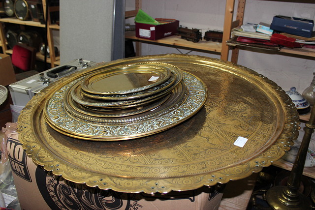 Appraisal: A LARGE INDIAN BRASS TRAY with pierced and engraved edge