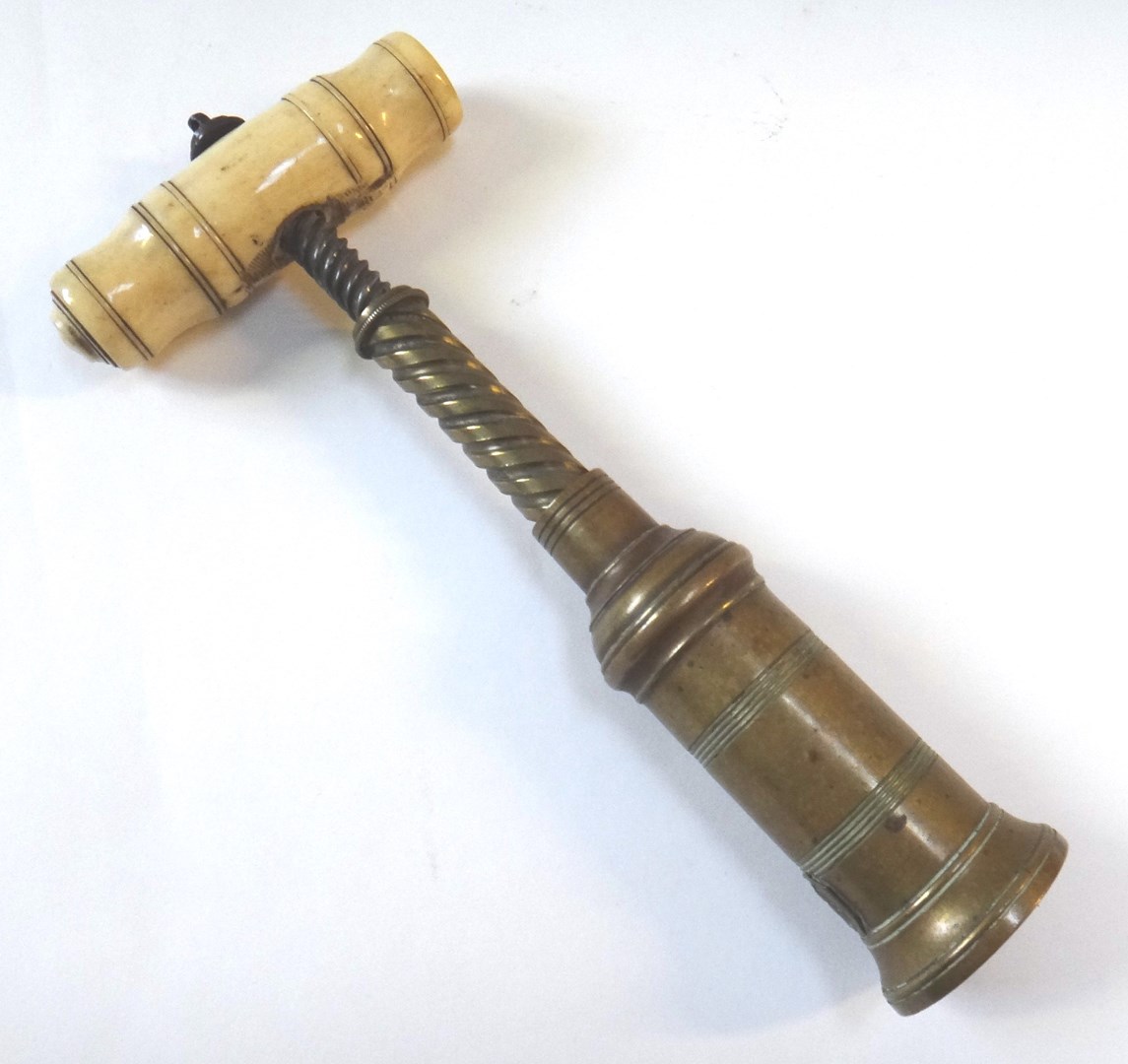 Appraisal: A Thomason type corkscrew th century with turned bone handle