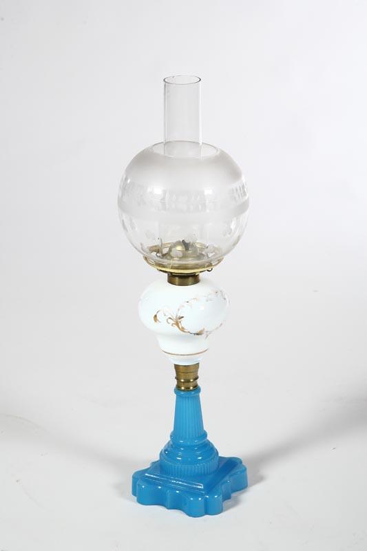 Appraisal: OIL LAMP American mid th century Cornflower blue glass reeded