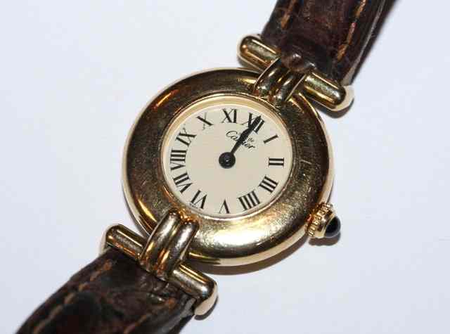 Appraisal: A LADIES SILVER GILT MUST DE CARTIER WRIST WATCH with