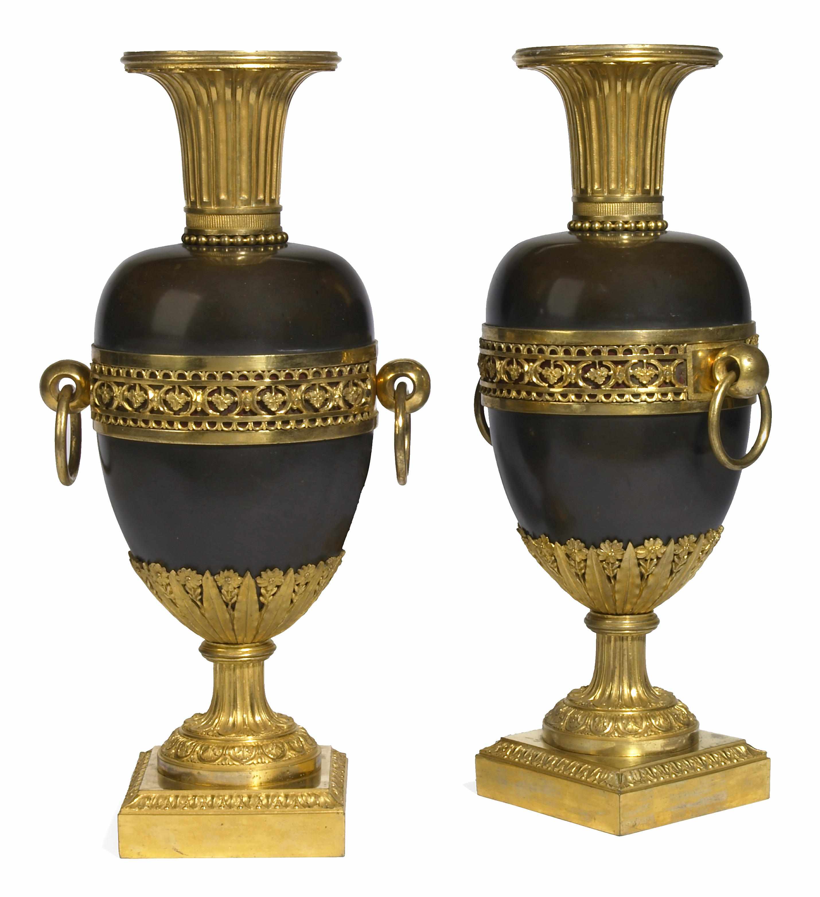 Appraisal: A pair of Louis XVI gilt and patinated bronze urns